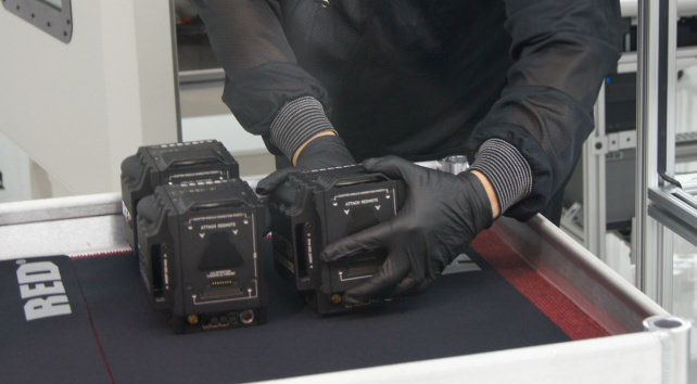 Red-booth-glovedhands.jpg